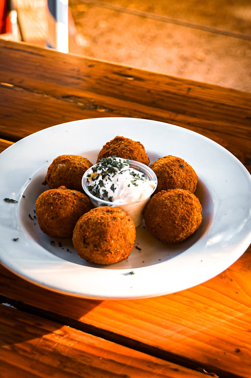 delicious fried arancini with creamy dip