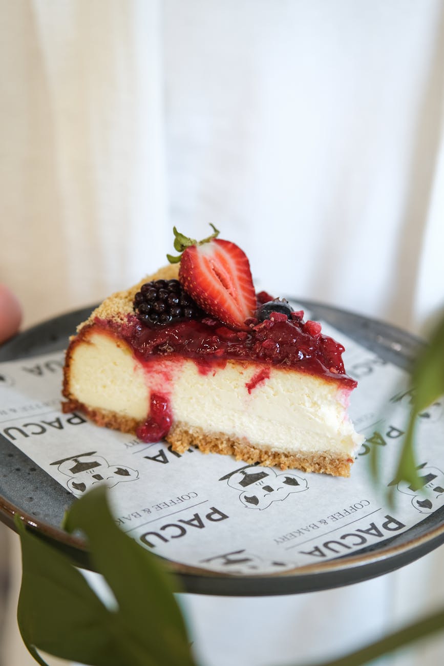 delicious cheesecake with mixed berries topping