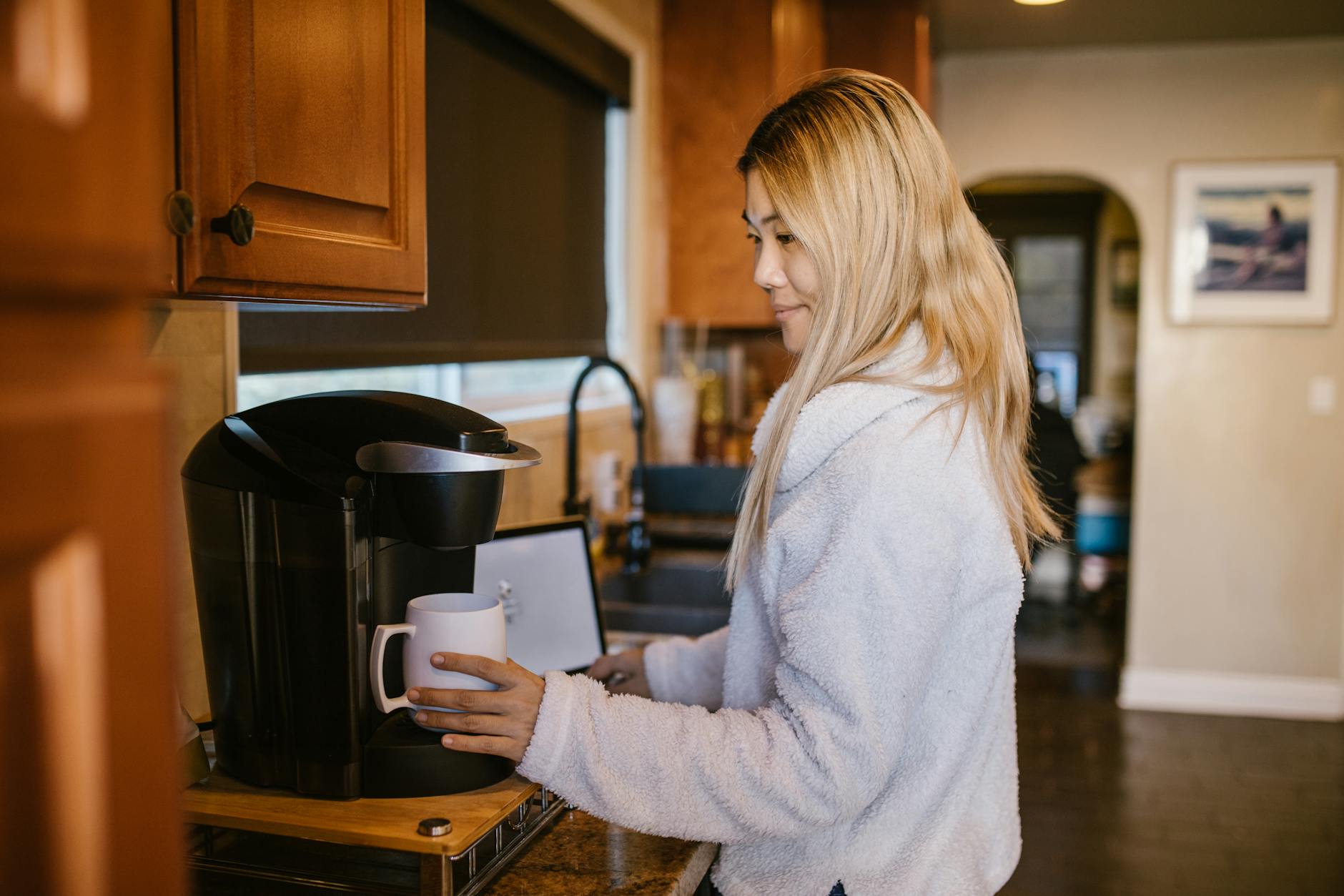 woman making coffee