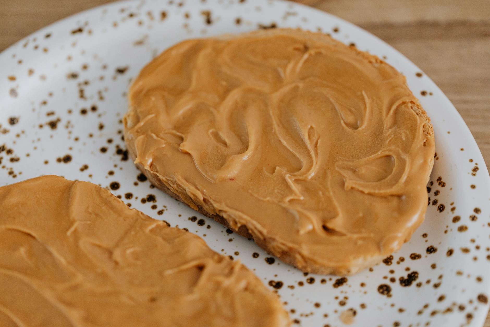 close up photo of toast with peanut butter
