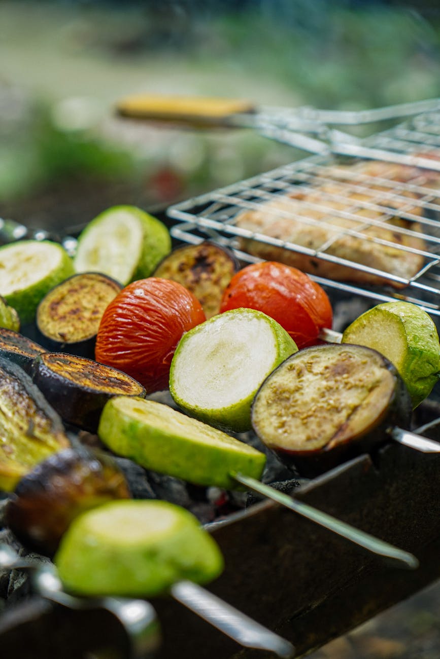sliced vegetables on skewers