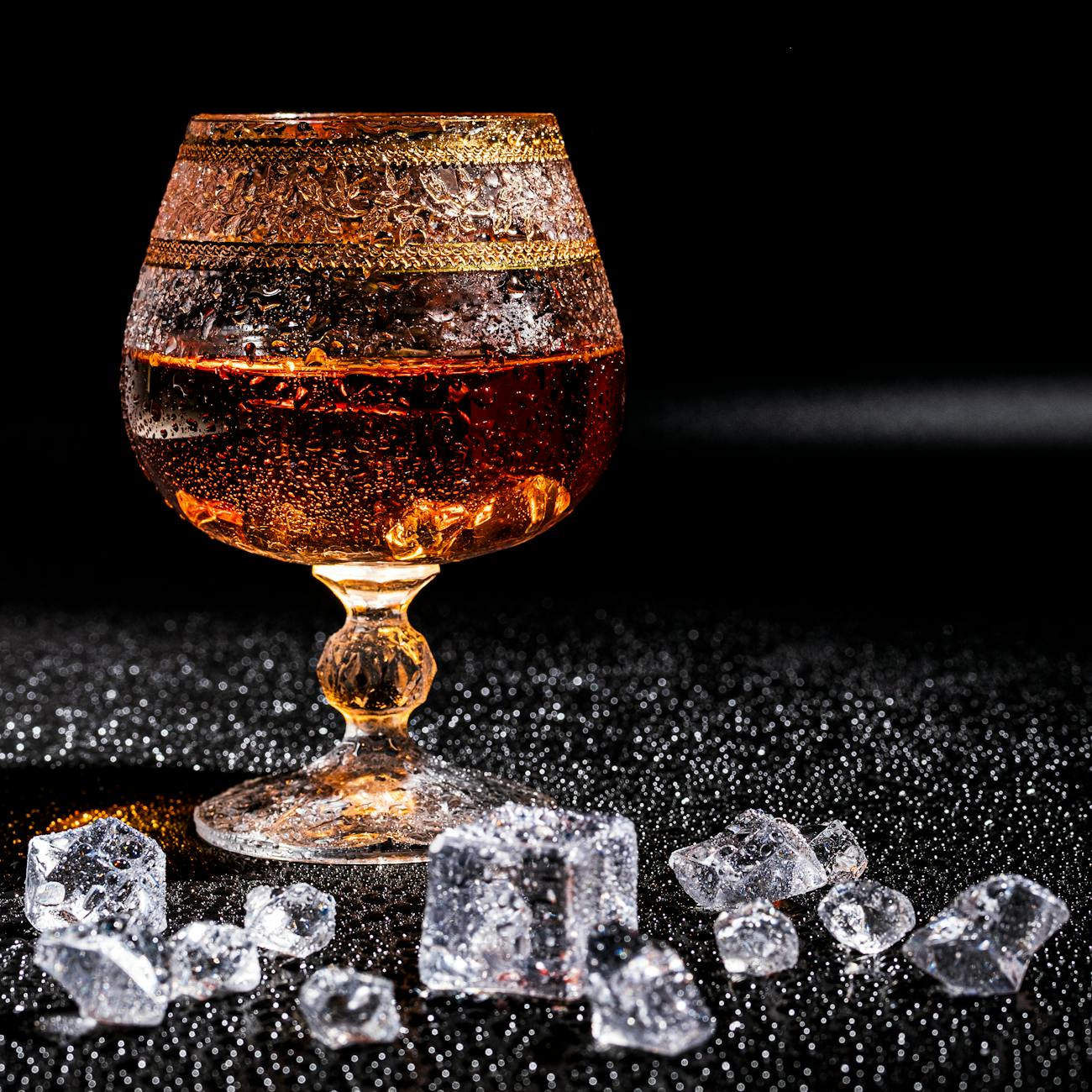 whiskey with ice on a wooden table reasonable consumption of alcoholic beverages