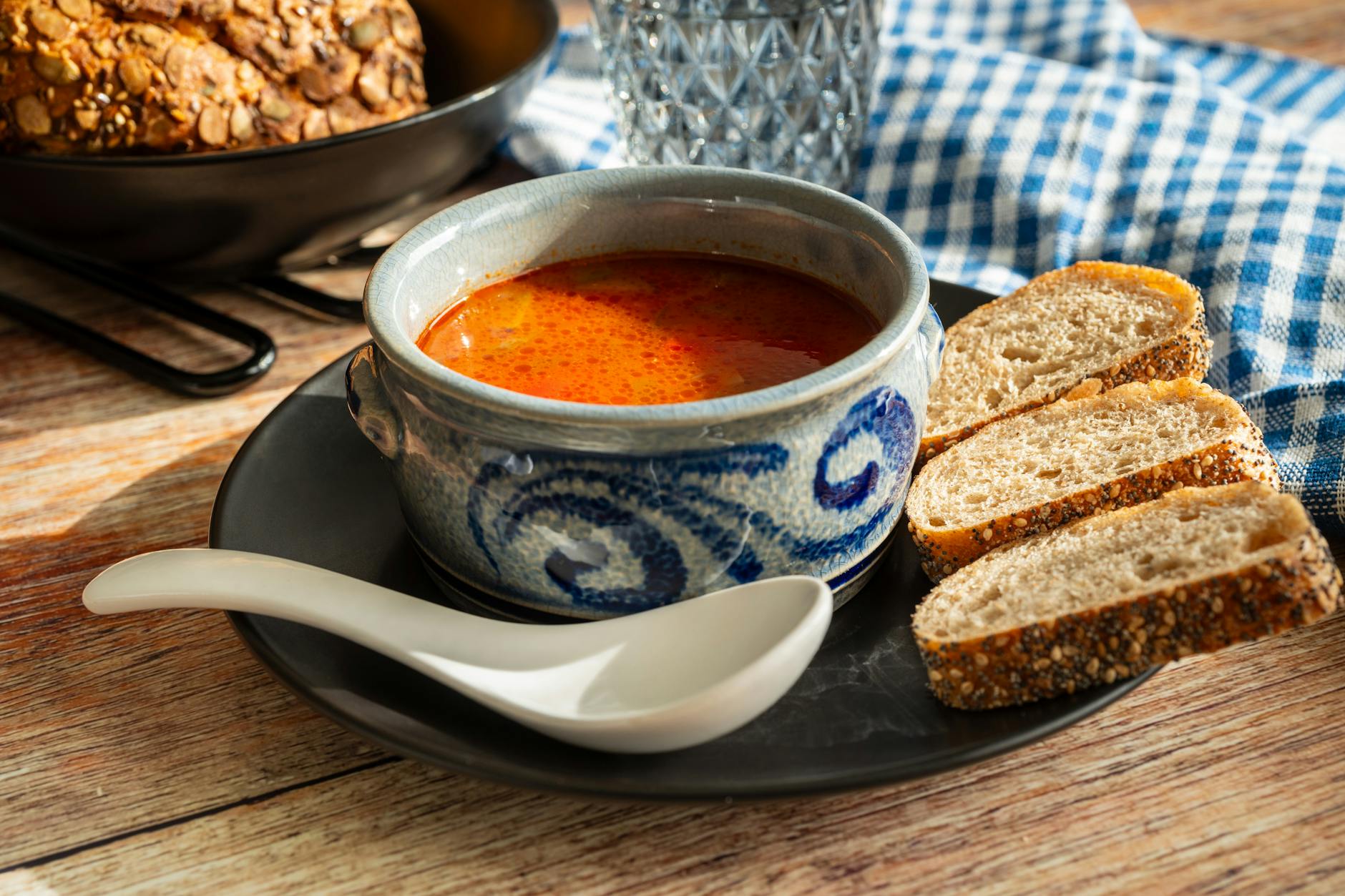 traditional eastern european solyanka soup with bread