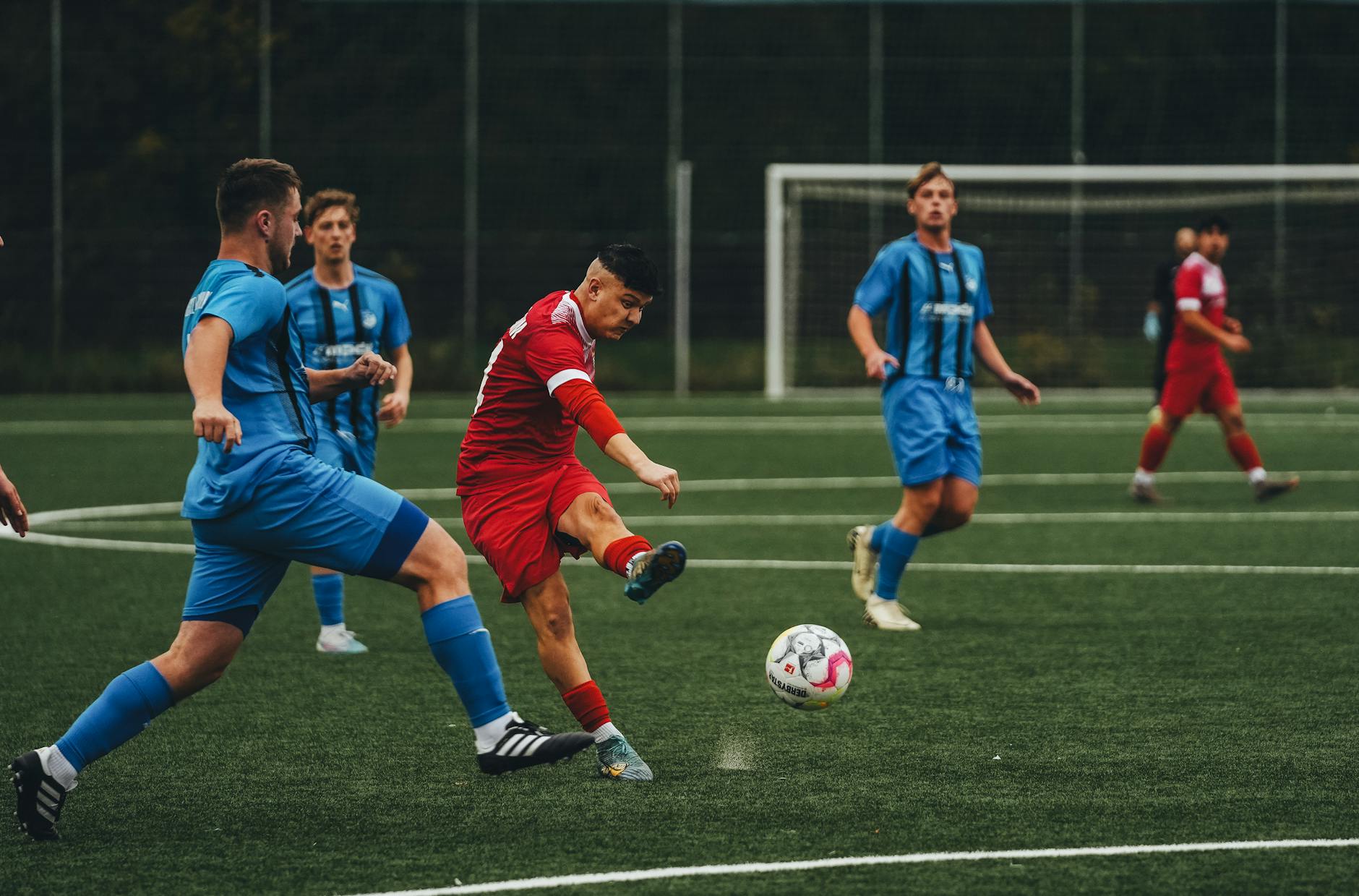 competitive soccer match on outdoor field