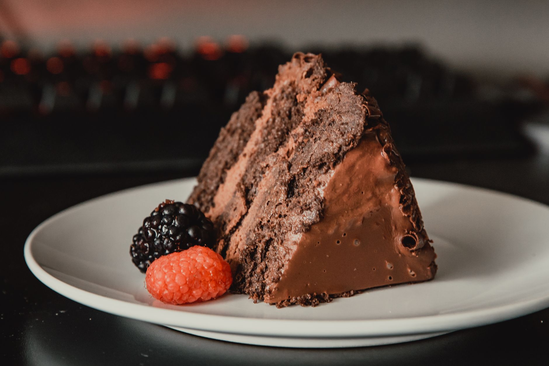 yummy chocolate cake served with blackberry