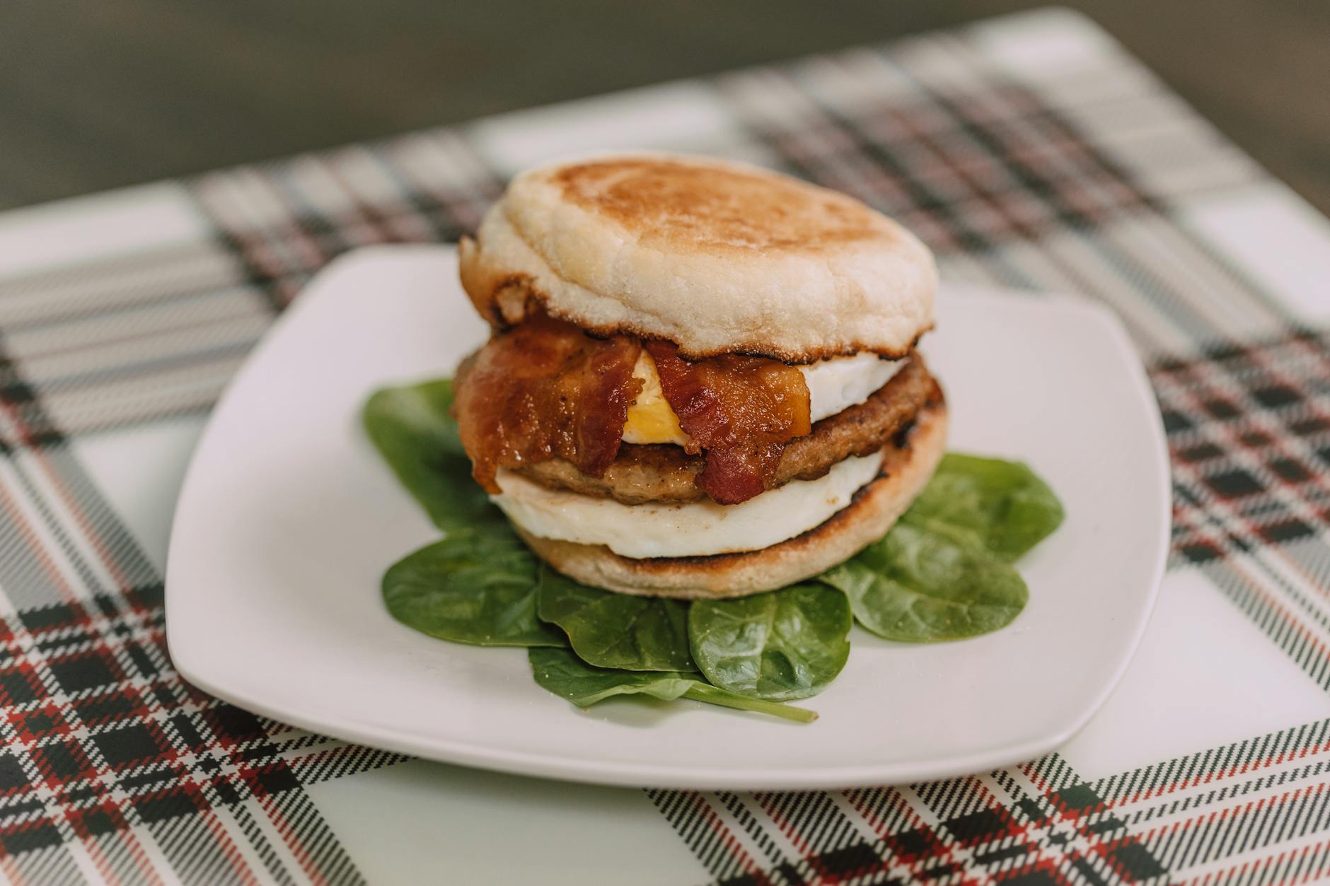 hamburger sandwich with bacon and egg