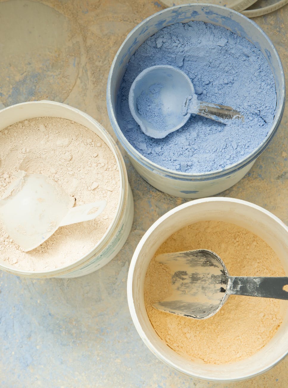 set of bowls with boiling cementitious material