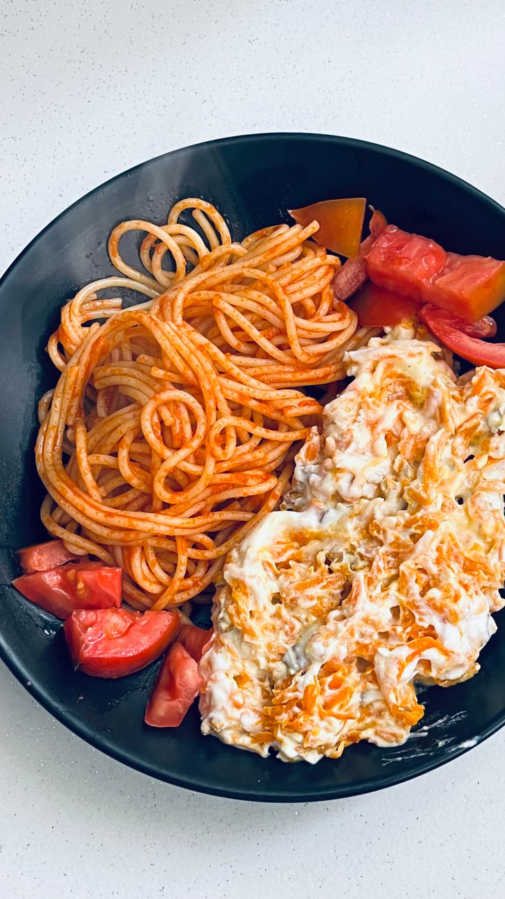 delicious spaghetti with tomato and cheese meal